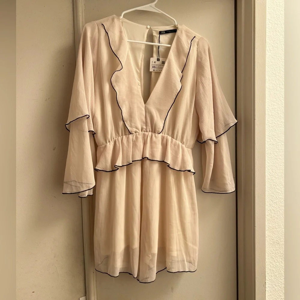 Ivory Ruffled V-Neck Romper - Picture 1 of 3